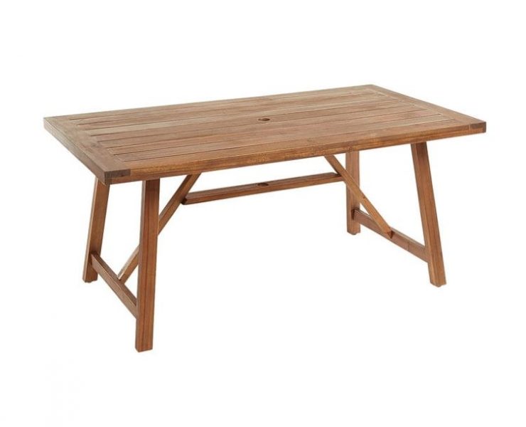 A bare wood table for outdoor dining