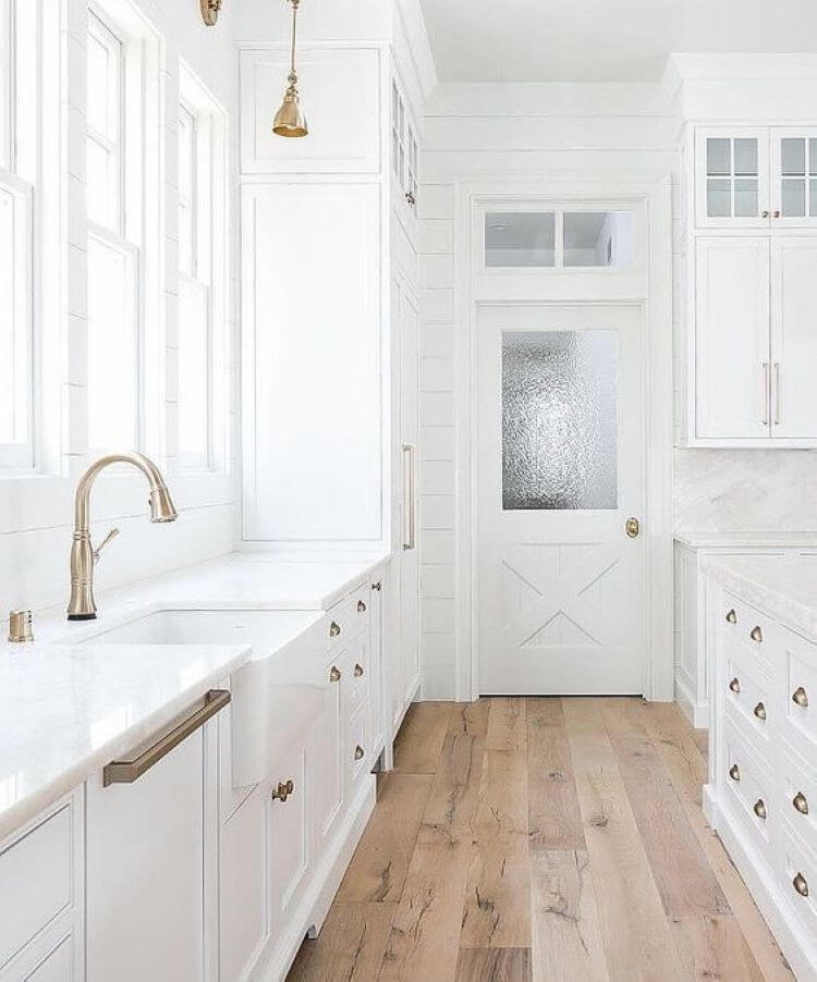 rustic wood floor colors with white kitchen counters and cabinets