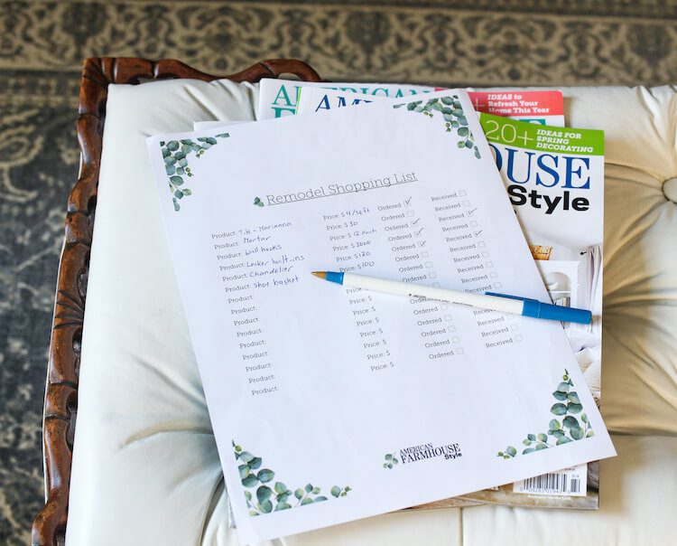 Shopping for a remodel worksheet on top of magazines on coffee table