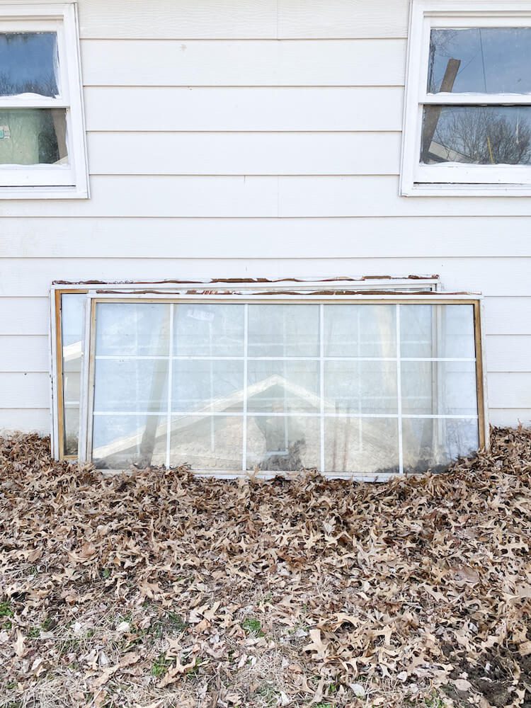 Before picture of side of white barn without greenhouse yet