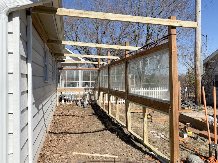 In-progress of greenhouse being built with no roof or side walls