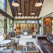 Music barn home living room with band setup and seating area