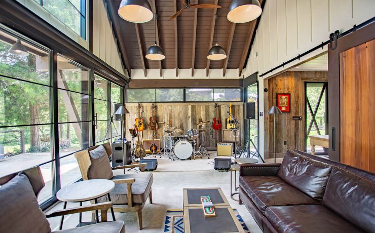 Music barn home living room with band setup and seating area