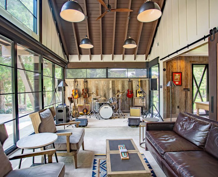 Music barn home living room with band setup and seating area