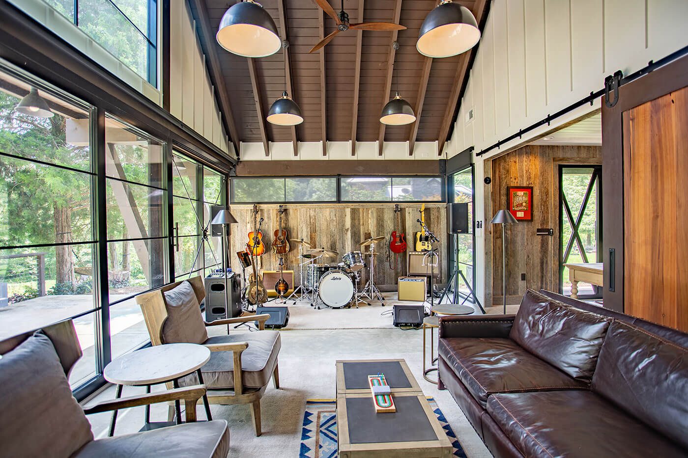 Music barn home living room with band setup and seating area