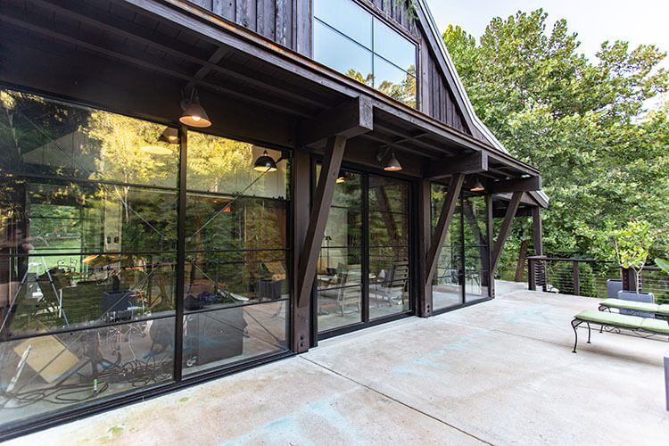 Outdoor patio area next to barn