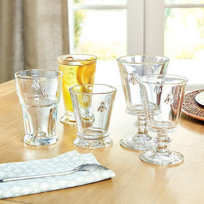 Set of bee glassware on a table