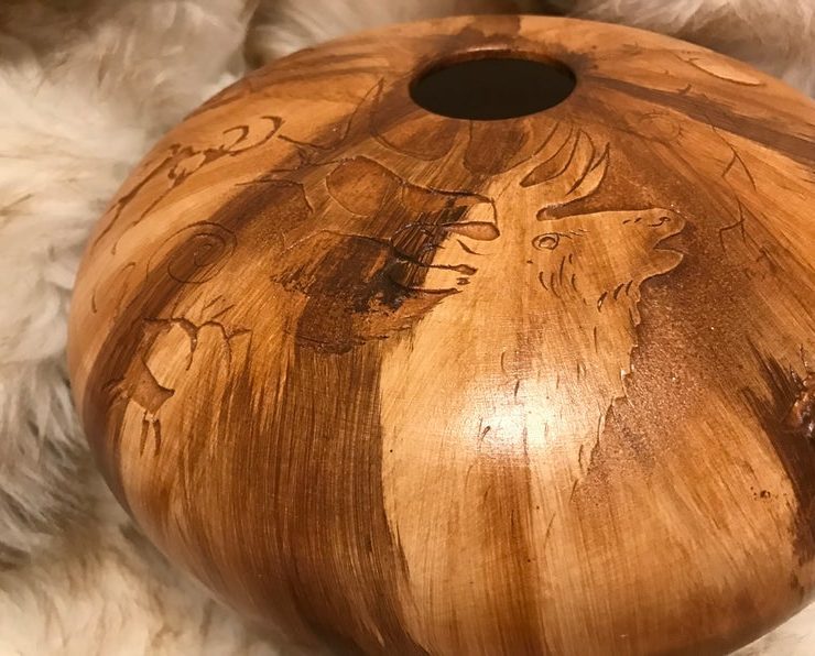 Navajo glazed wood pot with elk on it