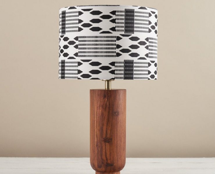Wood lamp with black and white geometric patterned lampshade