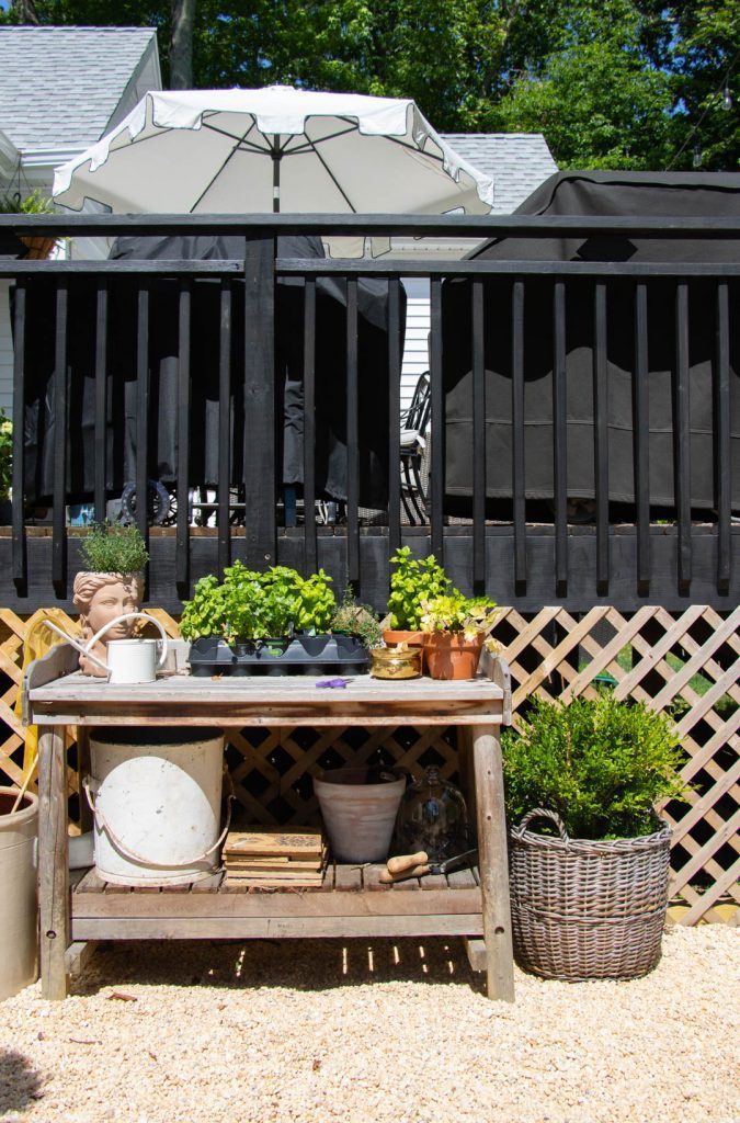 Fence with potting bench in front