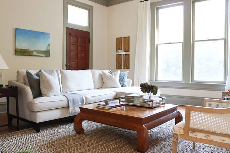 Living room with white sofa in farmhouse in progress