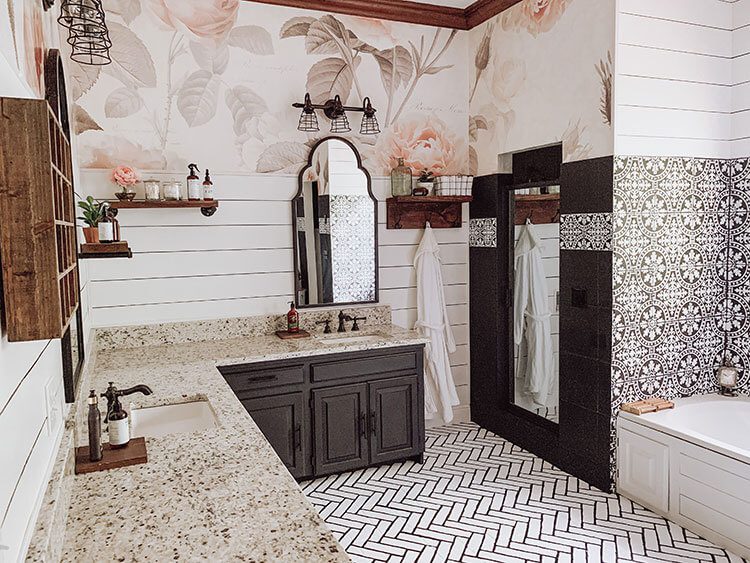 Bathroom with wallpaper, shiplap and marble countertops