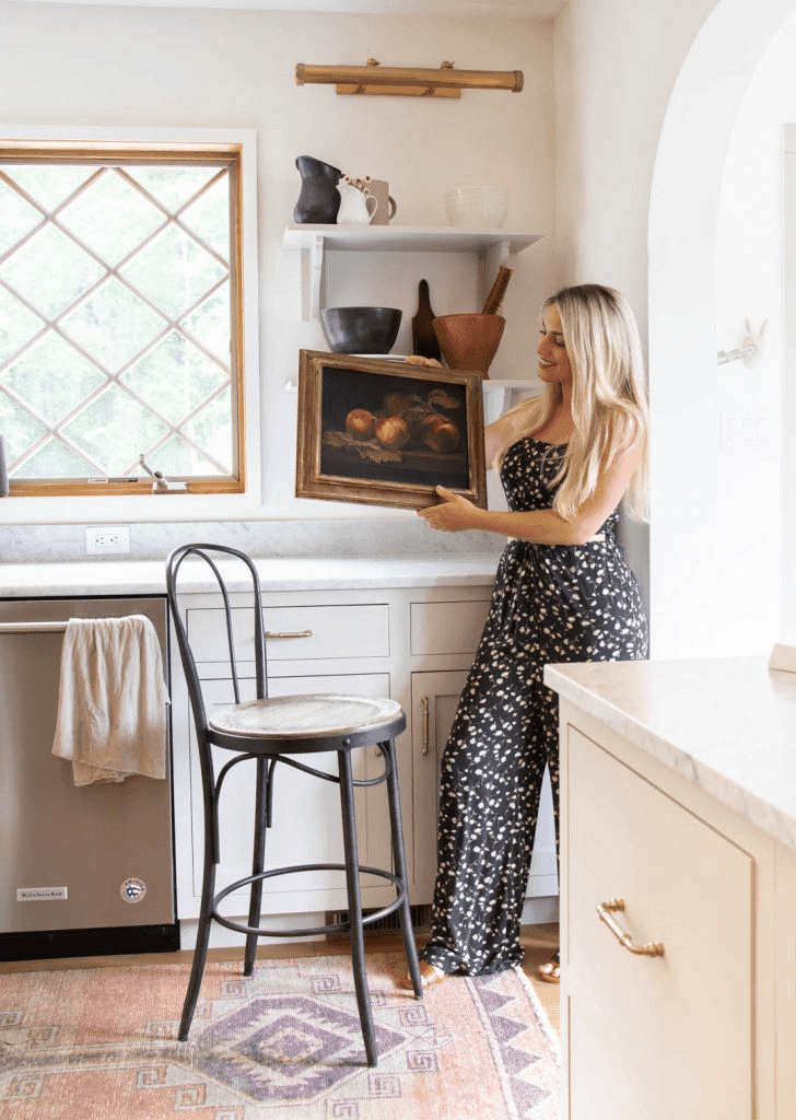 Deb Foglia adding a vintage print to her kitchen