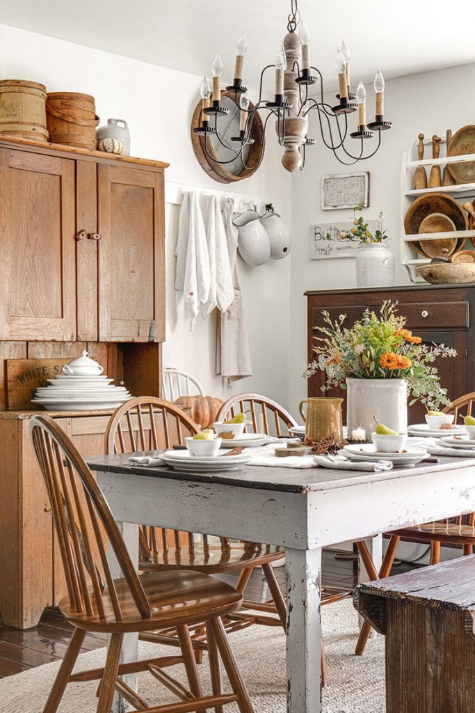 Rustic fall table with chandelier and centerpiece