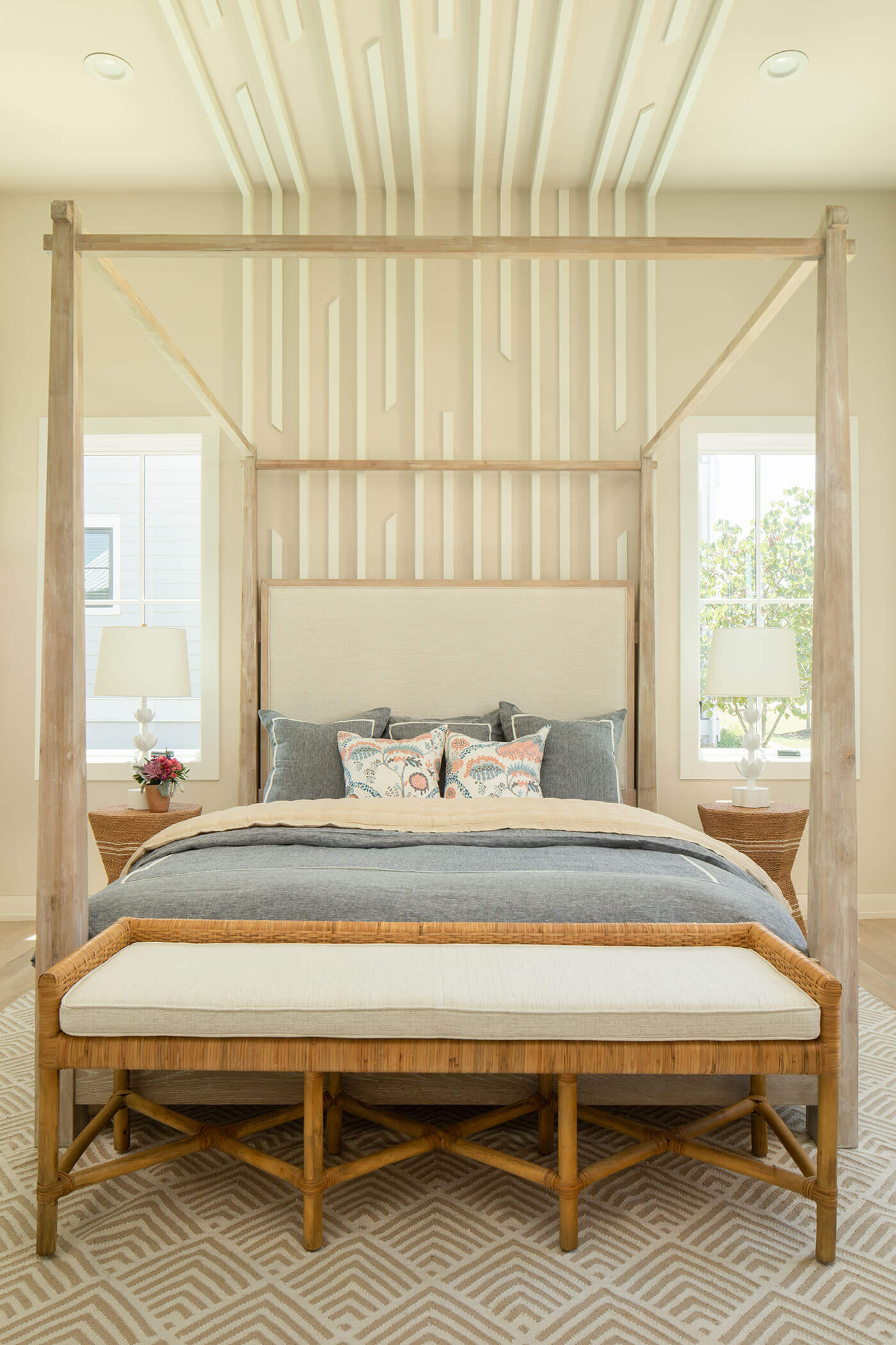 Bedroom with bed and custom millwork on wall and ceiling