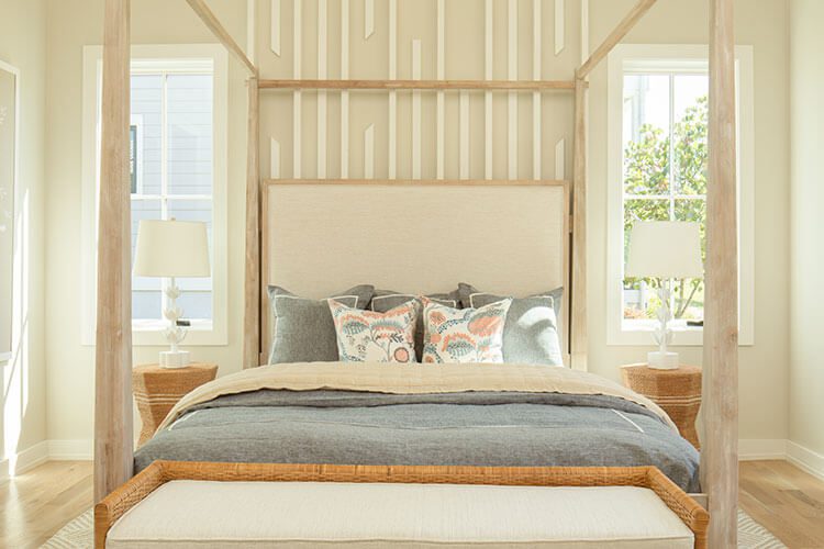 bed with custom wood accent on the wall and ceiling