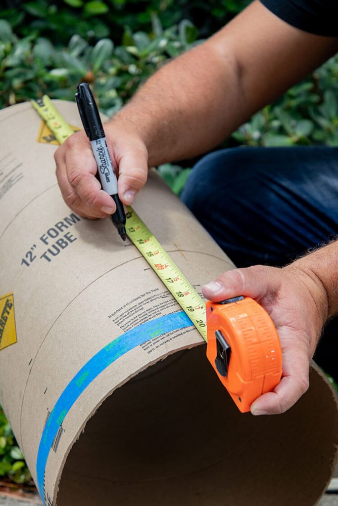 Man measuring a tube