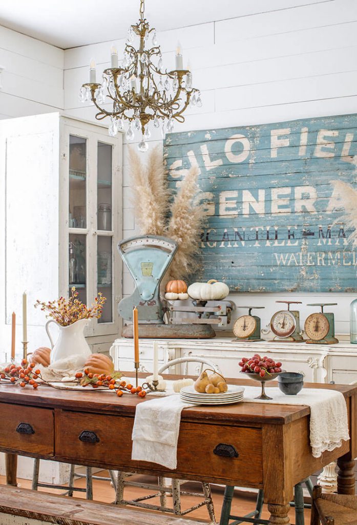 Dining room collecting vintage signs and fall tablescape