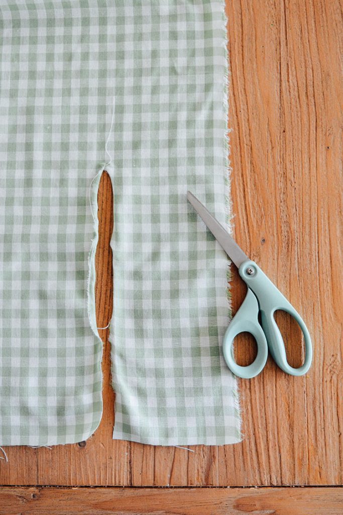 Buffalo check fabric on table with scissors