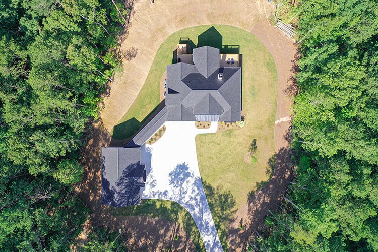 Aerial view of the home with attached garage