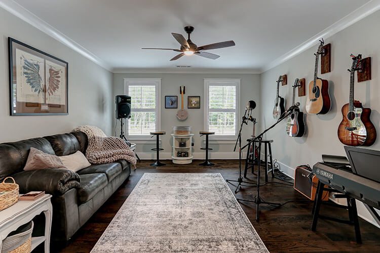 Music room with guitars hanging on the wall