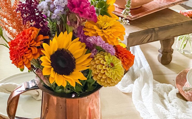 vase of sunflowers and other flowers close up photo for natural fall farmhouse decorating