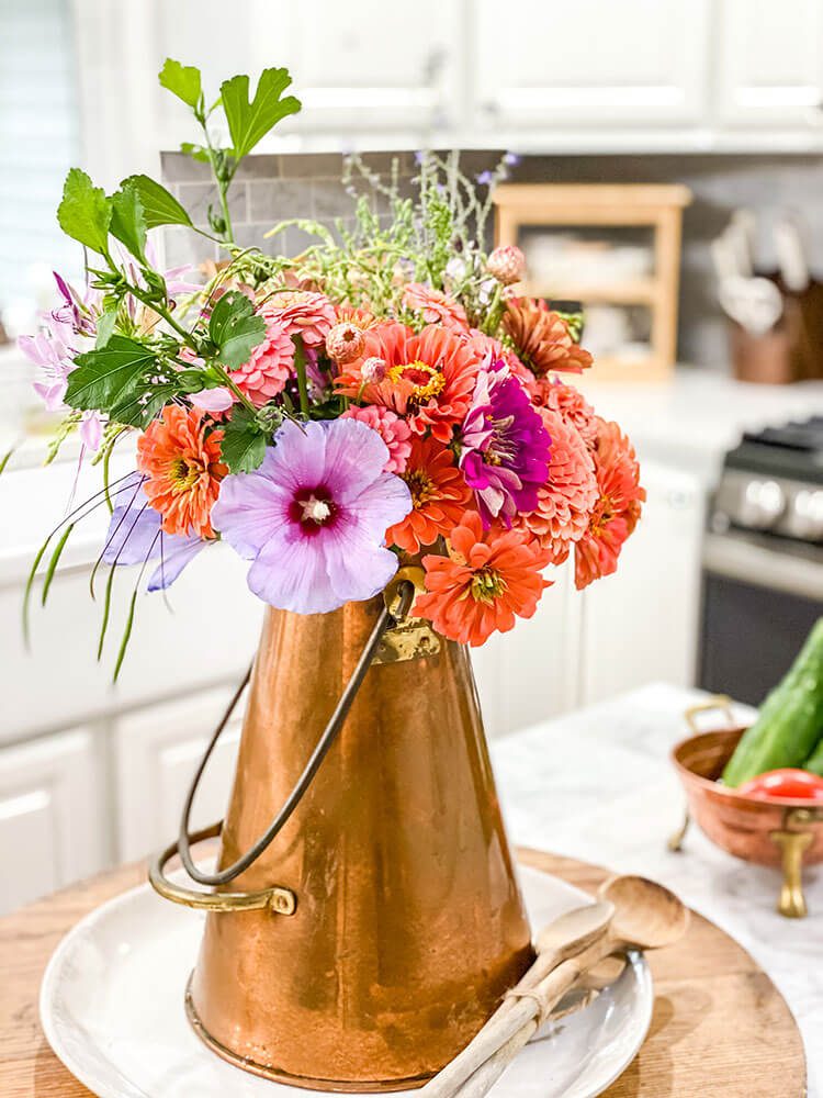 vase of flowers on countertop