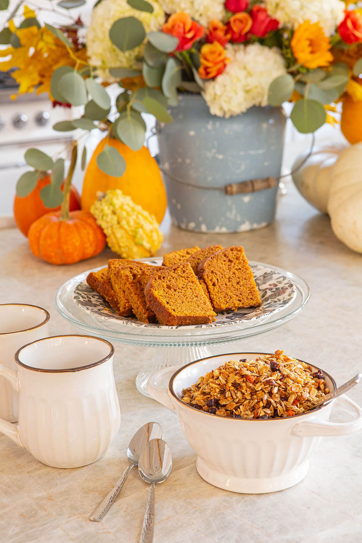 Fall granola close up with pumpkin bread on a plate