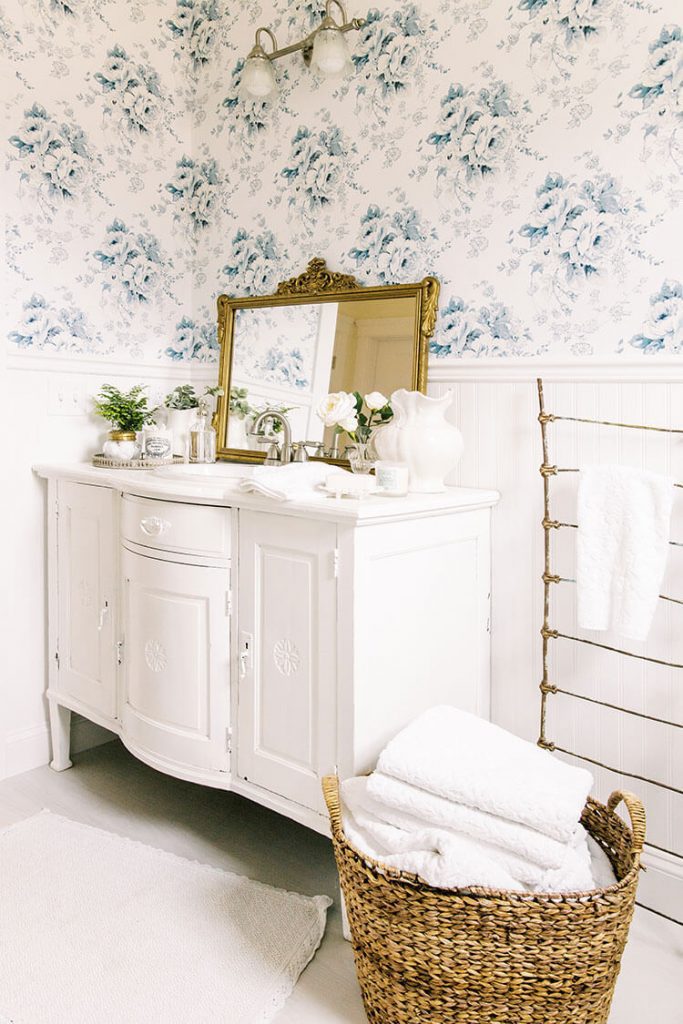 Blue and white bathroom with wainscotting for how to install wallpaper