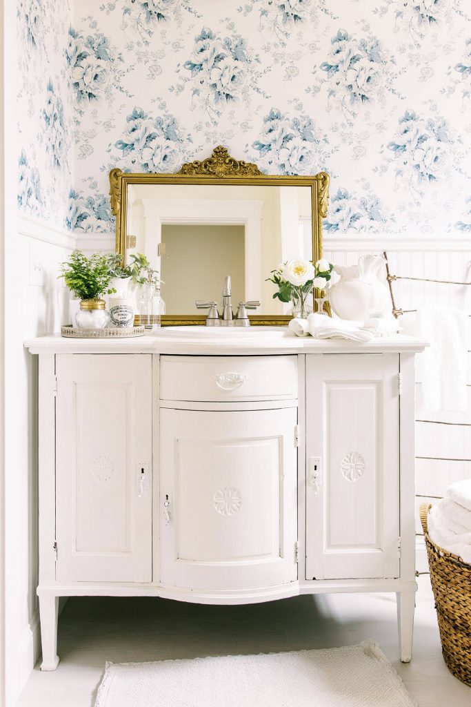 Bathroom with white vanity for install wallpaper for blue and white pattern