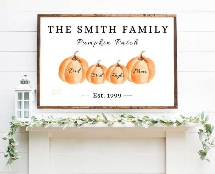 Custom family sign with family names and pumpkins over mantel