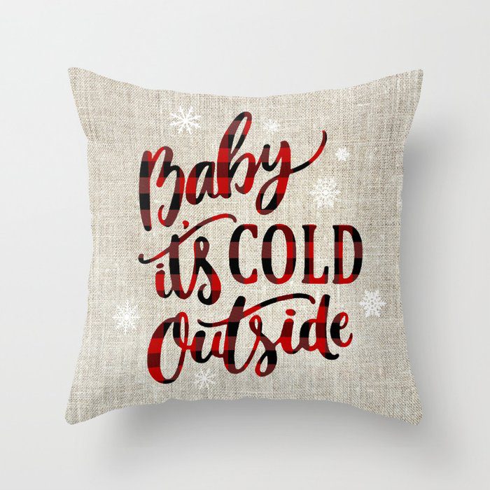 throw pillow that says Baby It's Cold Outside