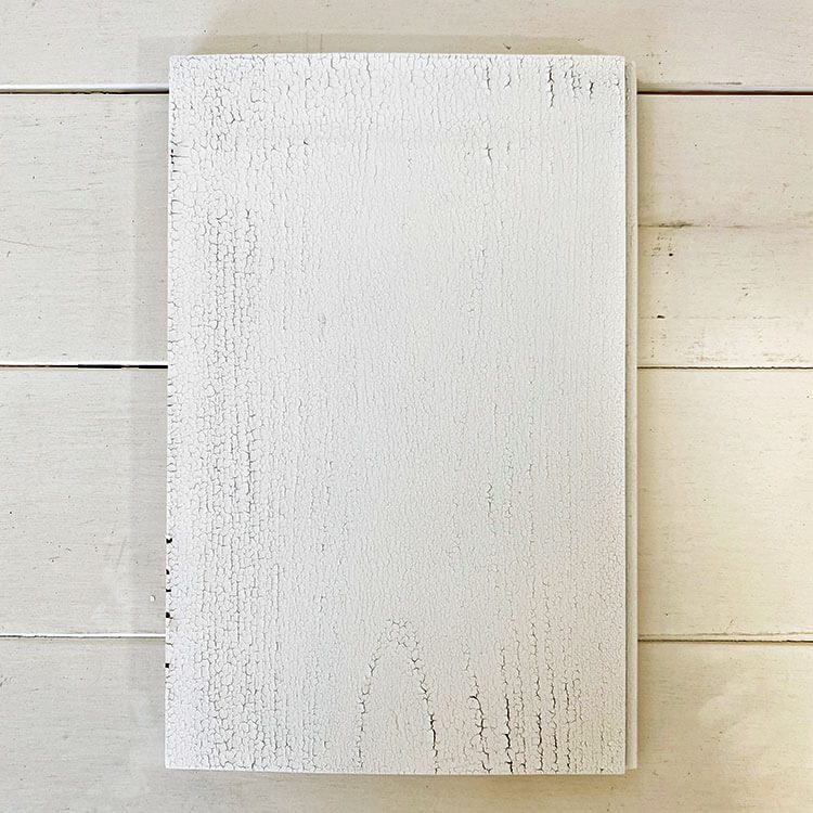 Piece of wood with flaking paint technique