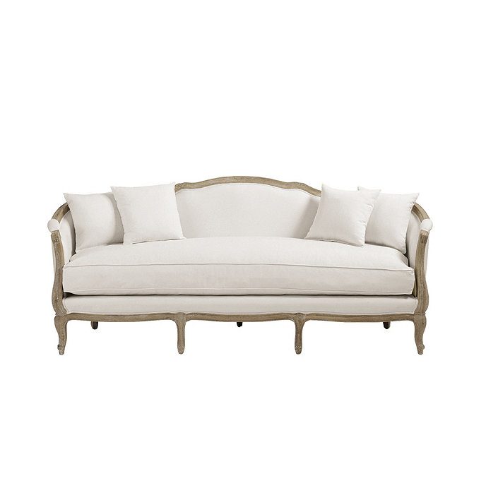 Cream sofa with rounded top