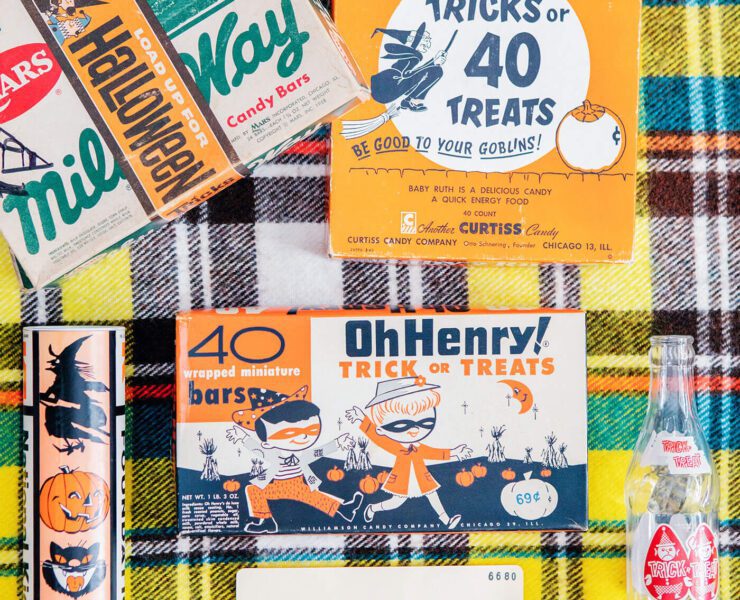 Old candy boxes on plaid background