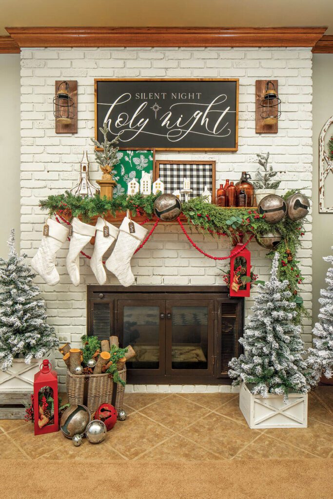 Fireplace and mantel with Christmas decor and garland