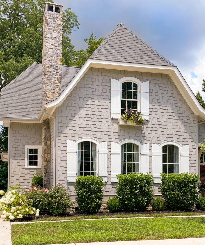 Finished cottage farm exterior with shutters