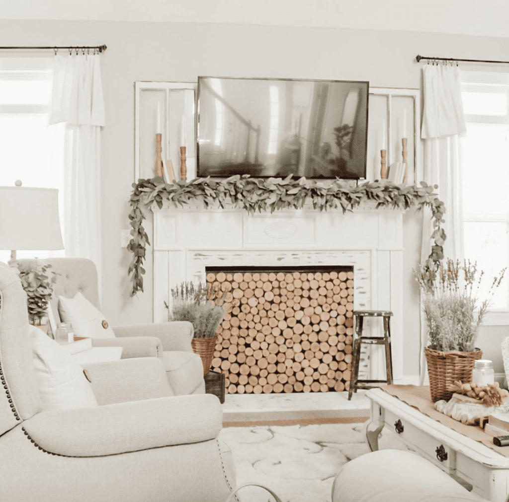 Faux fireplace with tv on top