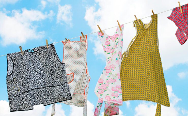 Aprons hanging on clothes line