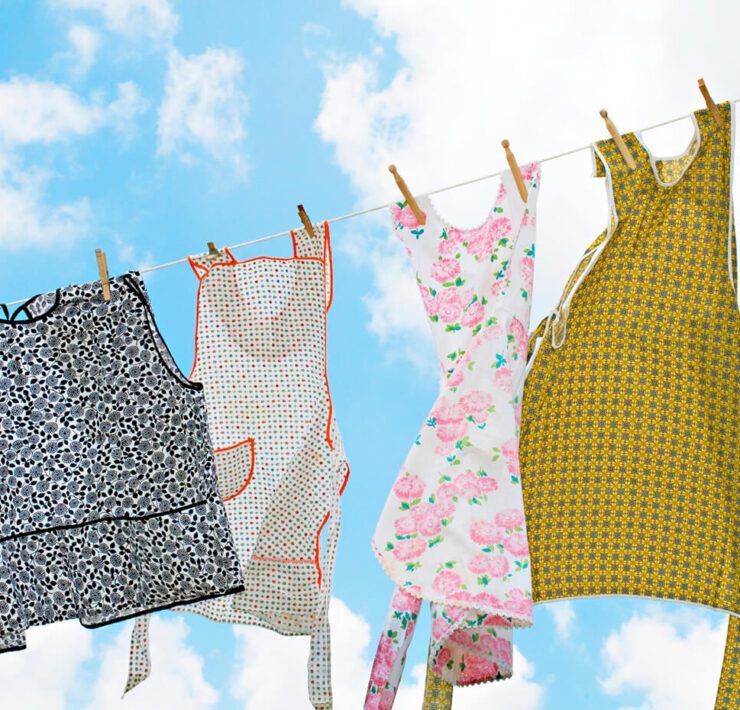 Aprons hanging on clothes line