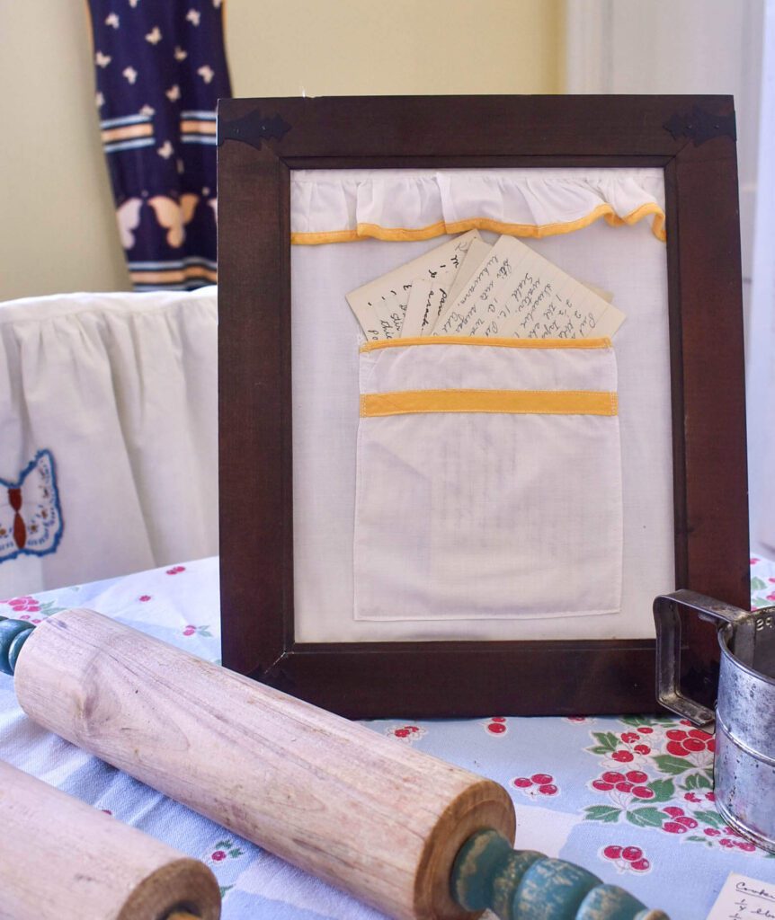 Framed fabric with recipe cards inside