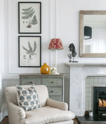 Living room with botanical prints framed on wall