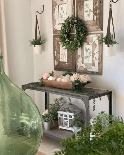 Living room with chippy frames and gallery of botanical prints