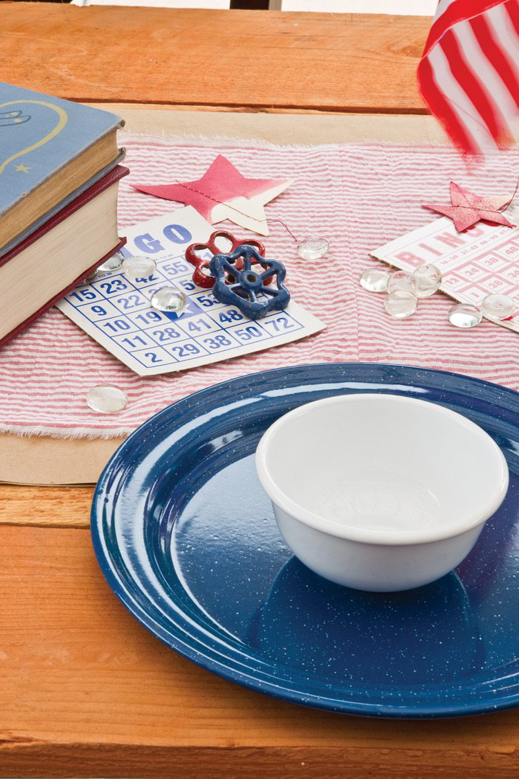 4th of July tablescape with enamel plates