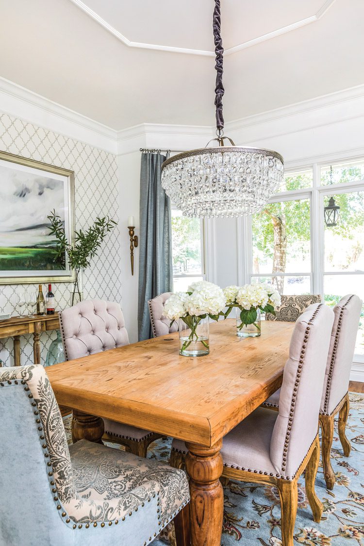 dining room with chandelier and upholstered seating