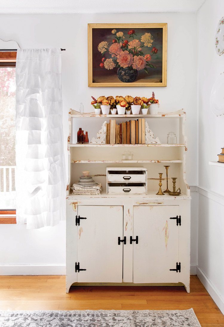 vintage hutch in neutral cozy home