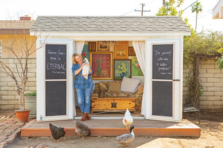 she shed with chalkboard doors and roaming chickens and ducks