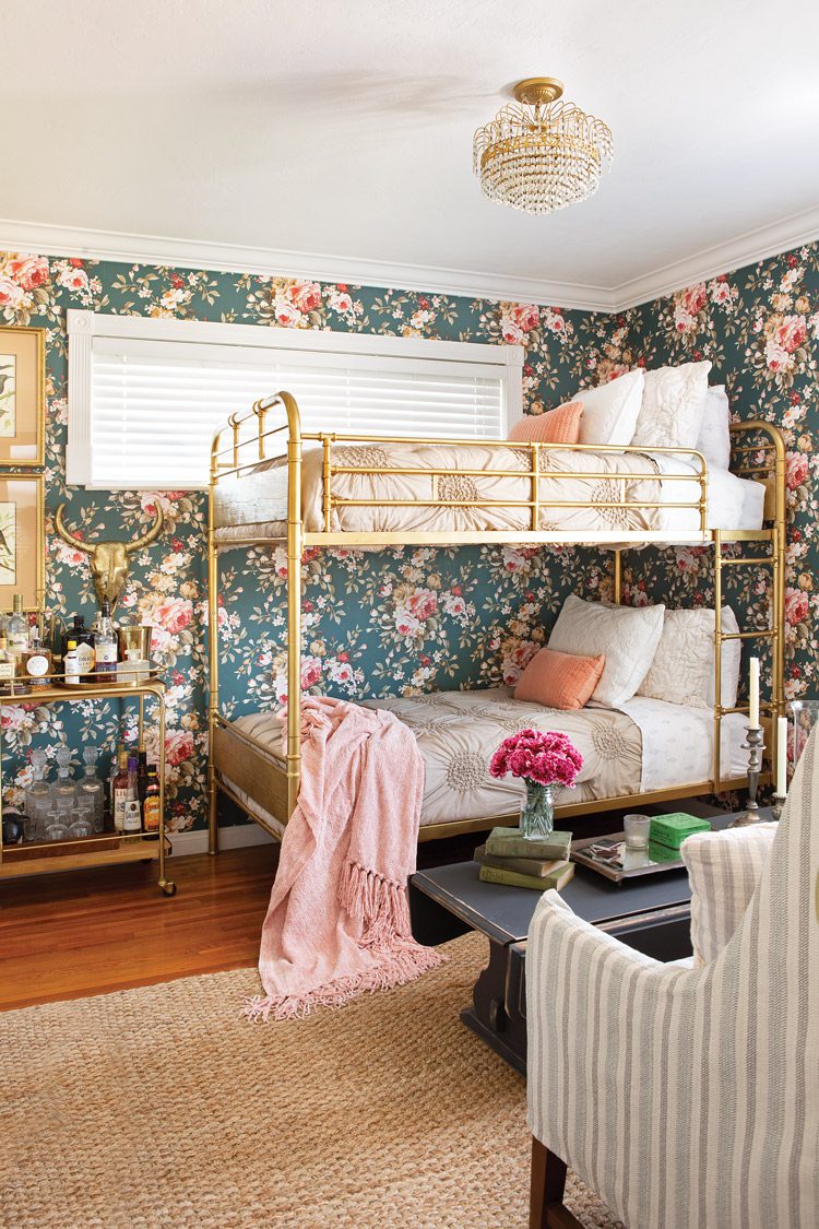 teal and pink floral wallpaper and gilded adult bunkbeds