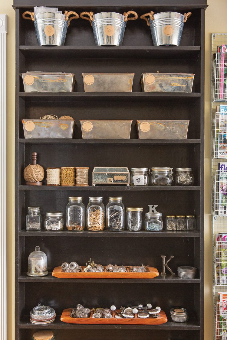 bead collection in jars and galvanized tins