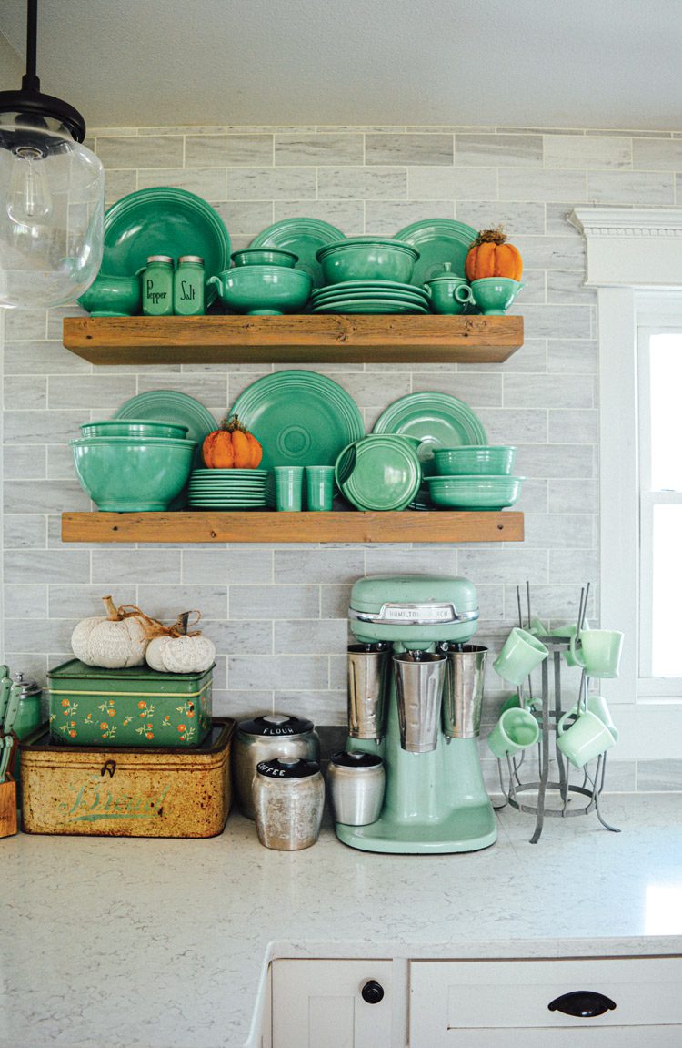 vintage jadeite display in kitchen with fall decor
